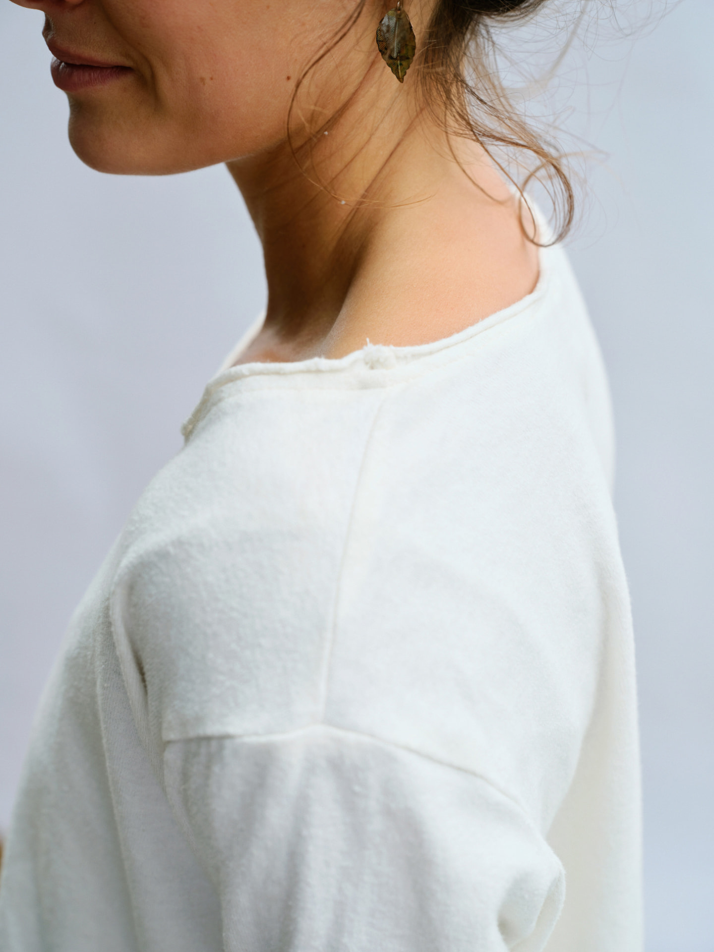 Close view of the Bonnie-love soft raw-finish neckline